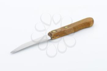 Small peeling knife with wooden handle