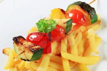Dish of vegetable skewer and French fries