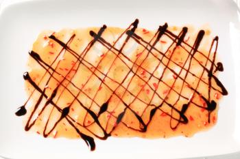 Sweet chilli sauce with balsamic vinegar on plate