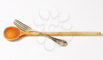 Wooden spoon and metal fork