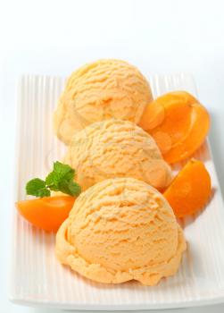 Scoops of apricot ice cream