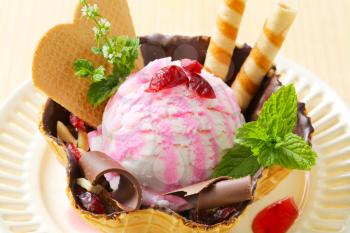 Ice cream served in chocolate coated waffle basket