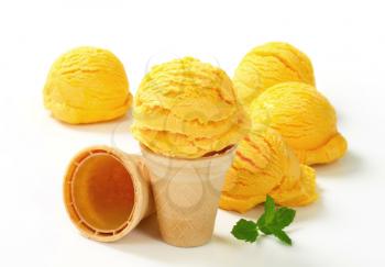 Scoops of yellow ice cream 