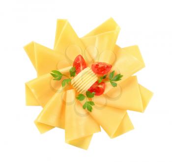 Thin slices of cheese on white background