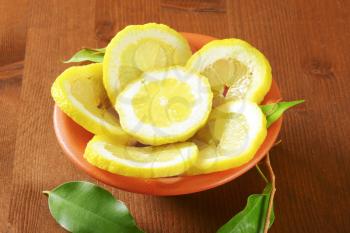 Slices of fresh lemon in a bowl