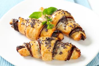 Chocolate-filled croissants on plate