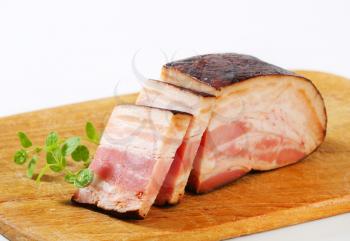 Smoked bacon on cutting board