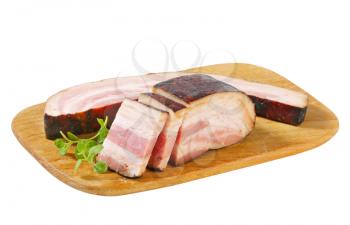 Smoked bacon on cutting board