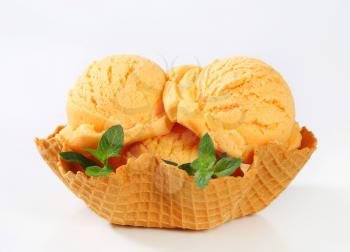 Scoops of ice cream in a waffle basket