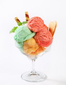 Scoops of fruit sherbets decorated with wafers