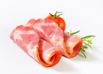 Thin slices of smoked pork neck - rolled up