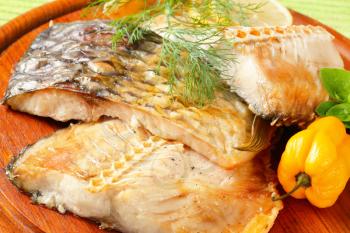 Oven baked carp fillets with dill