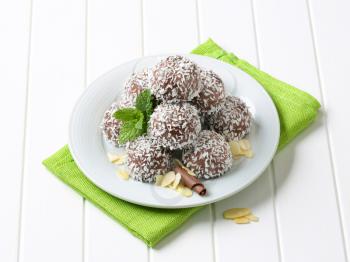 No-bake chocolate snowball cookies rolled in coconut