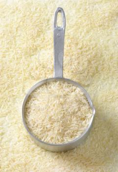 Uncooked Jasmine rice in a saucepan