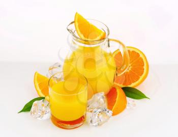 Fresh orange juice in a glass jug