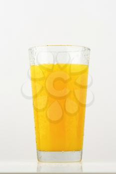 Glass of orange juice - studio shot