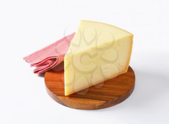 Wedge of Parmesan cheese - studio shot