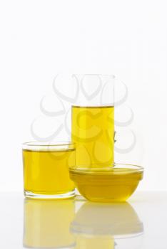 Olive oil in glasses and bowl