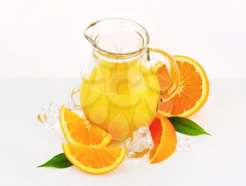 Fresh orange juice in a glass jug