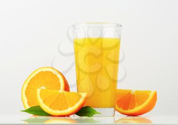 Glass of orange juice with ice