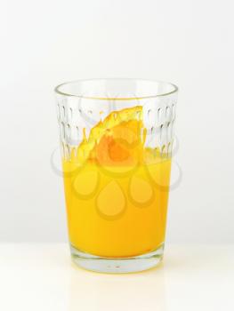 Glass of orange juice - studio shot