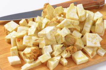 Diced celery root on cutting board