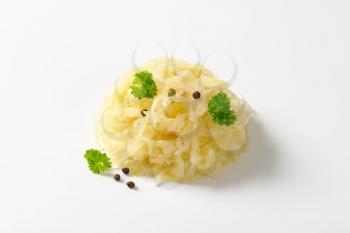 Heap of sauerkraut on white background