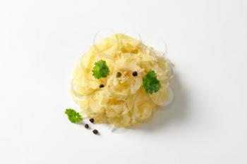 Heap of sauerkraut on white background