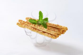 Puff-pastry strips with cheese topping