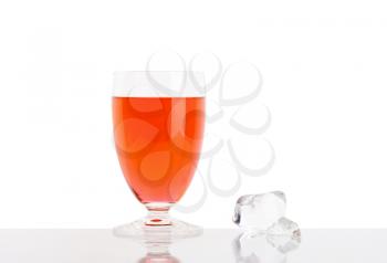 Glass of fresh red juice on white background