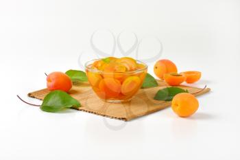 Compote made of halved apricots in light syrup