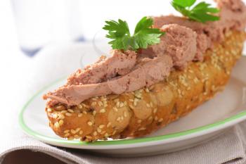 Wholegrain bread roll with liver pate