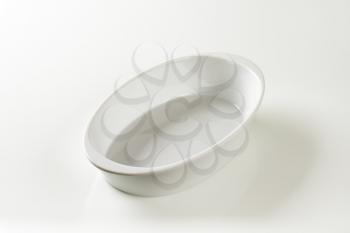 Empty deep oval porcelain dish - no handles