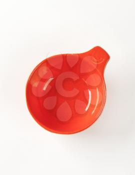 Red glazed ceramic cup or soup bowl