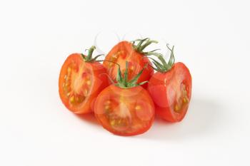 red tomatoes cut into halves