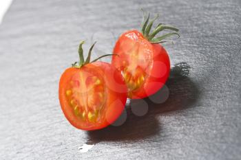 red tomato cut in halves