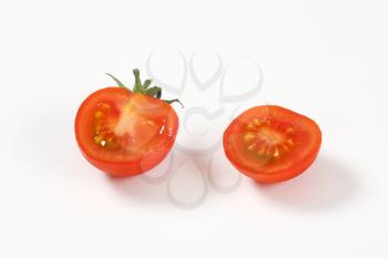 red tomato cut in halves