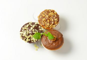 Assorted muffins - one chocolate muffin, two muffins with nuts