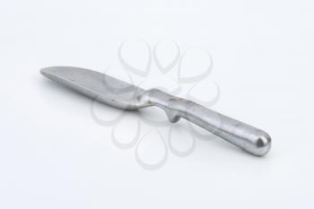 old metal scoop on white background