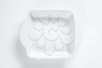 white ceramic baking dish with handles