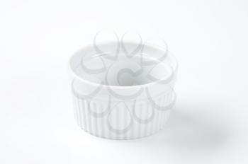 white china ramekin for souffles to creme brulees