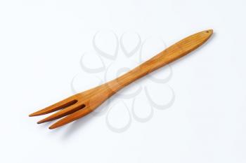 Three pronged fork made of wood