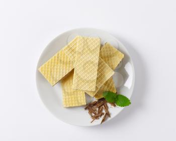 chocolate wafers on white plate