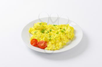 scrambled eggs sprinkled with chopped parsley