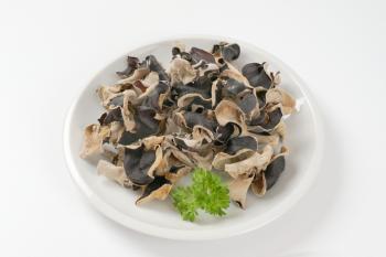 Heap of air dried wood ear mushrooms on plate