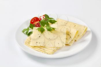 thin sliced cheese flavored with herbs