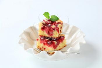 raspberry sponge cake  slices in decorative dish