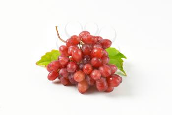 bunch of wet red grapes