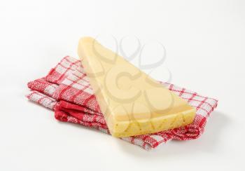 Piece of Parmesan cheese on a cloth