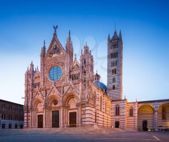 Siena Cathedral and bell tower at dusk, Siena, Italy, Europe